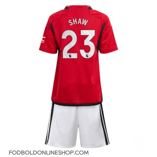 Manchester United Luke Shaw #23 Hjemme Trøje Børn 2023-24 Kortærmet (+ Korte bukser)